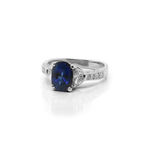 Platinum Ring With Oval Sapphire Center & Diamond Accents