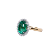 18k Yellow Gold Oval Emerald & Diamond Halo Ring