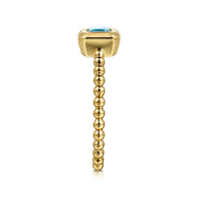 Gabriel & Co. 14k Yellow Gold Bujukan Bezel Set Blue Topaz and Beaded Shank Ring