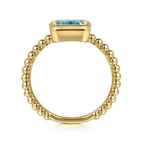 Gabriel & Co. 14k Yellow Gold Bujukan Bezel Set Blue Topaz and Beaded Shank Ring